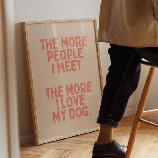 The more people I meet, the more I love my dog - Cream & Peach Artprint